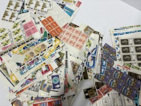 Large quantity of mint unmounted 20thC stamps including blocks and strips, mainly GB EQII (Qty)