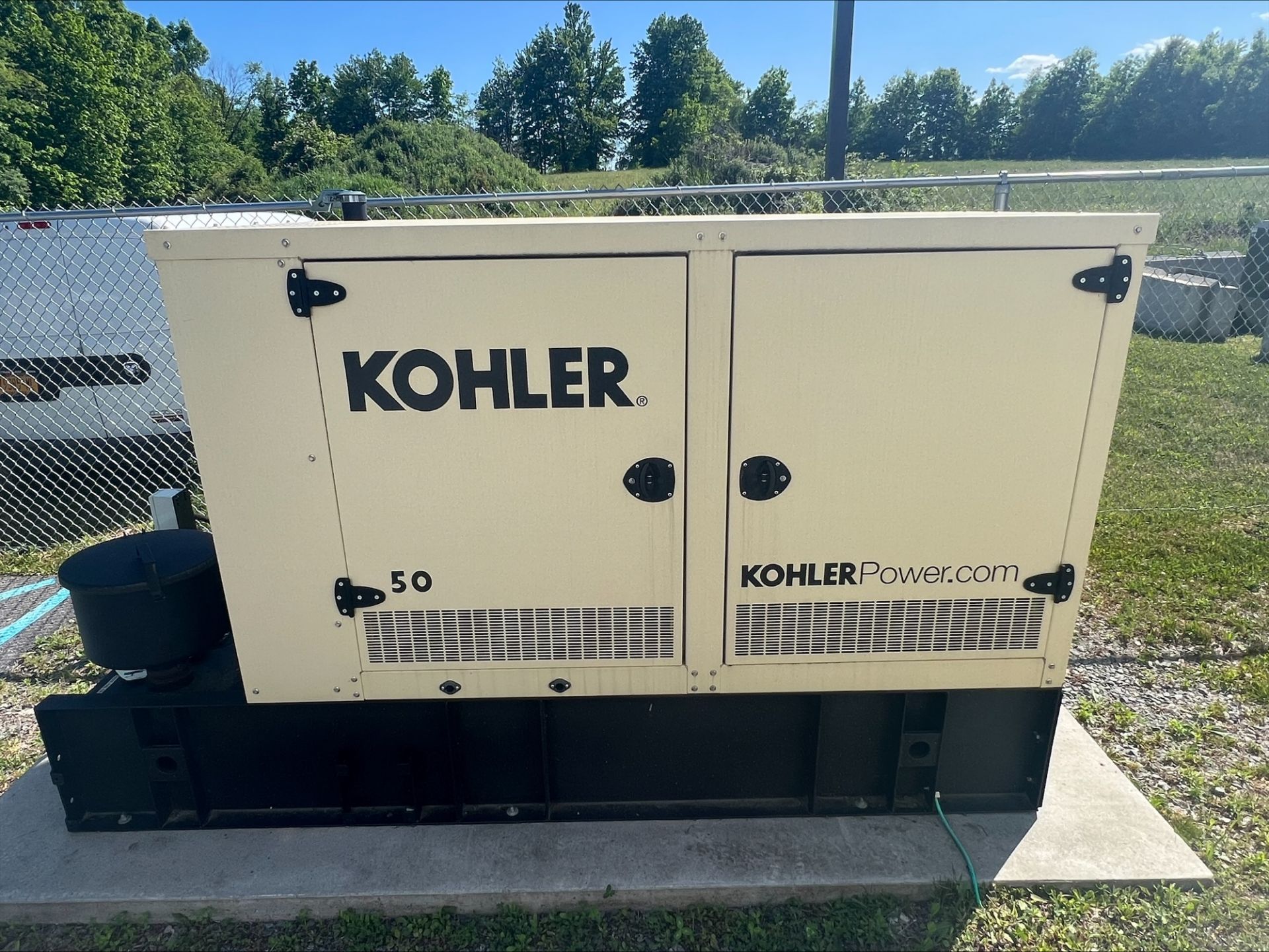 Used Kohler Industrial Diesel Generator w/ Transfer Switch. Model 50REOZK.