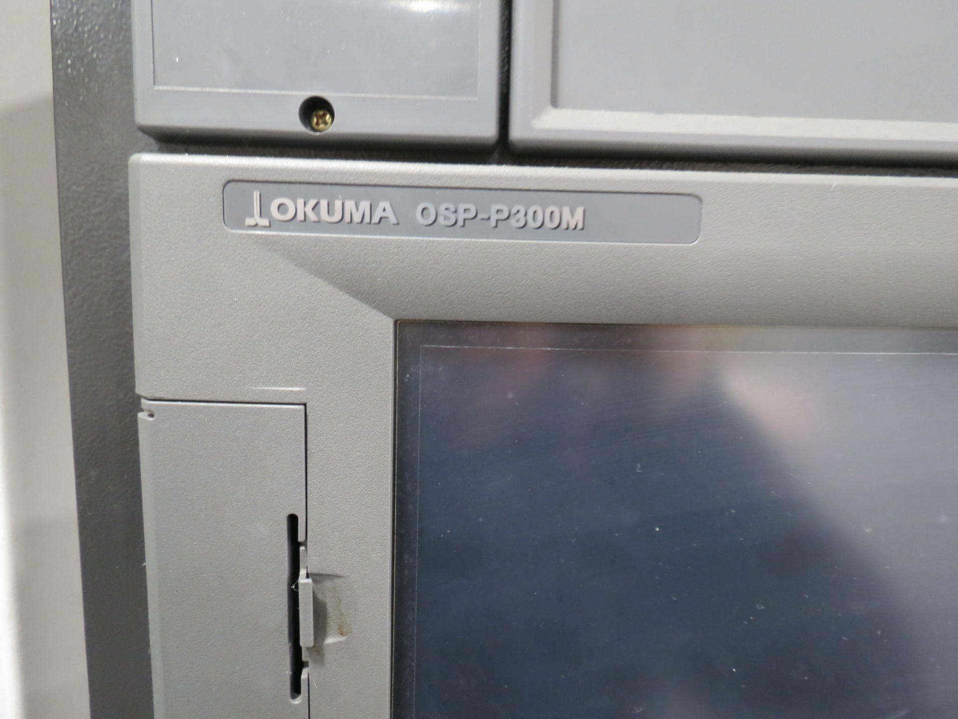 2014 OKUMA GENOS M560-V CNC VERTICAL MACHINING CENTER WITH OKUMA QSP-P300M CONTROL, SN: 179880, - Image 5 of 11