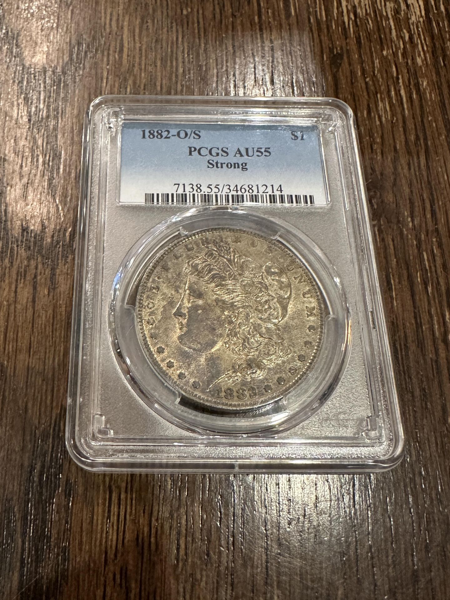 PCGS AU55 STRONG 1882-0/S $1 COIN VALUED $750