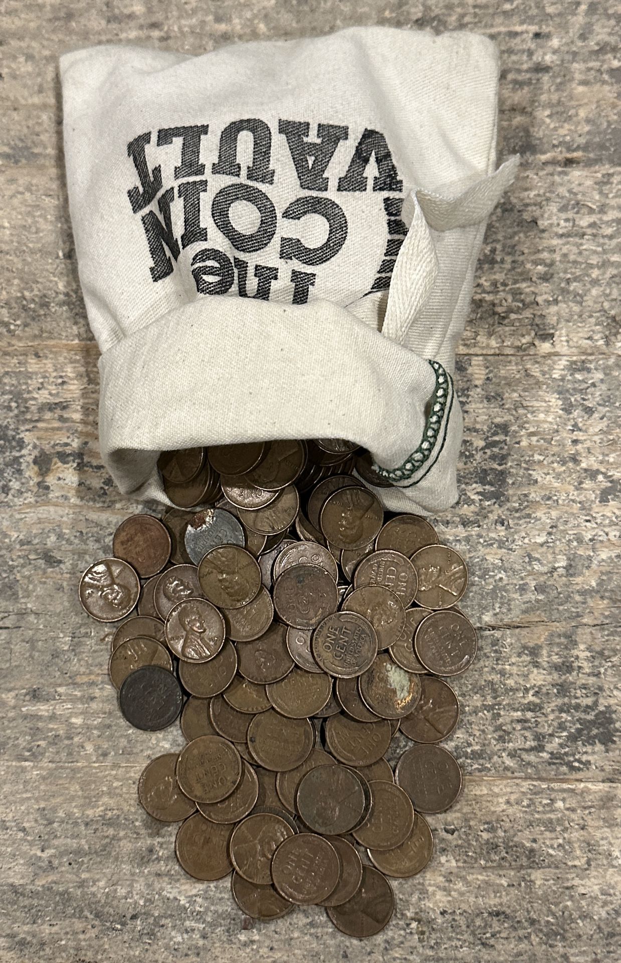 THE COIN VAULT BAG FILLED WITH LOOSE PENNIES, WEIGHT 3.3 LBS