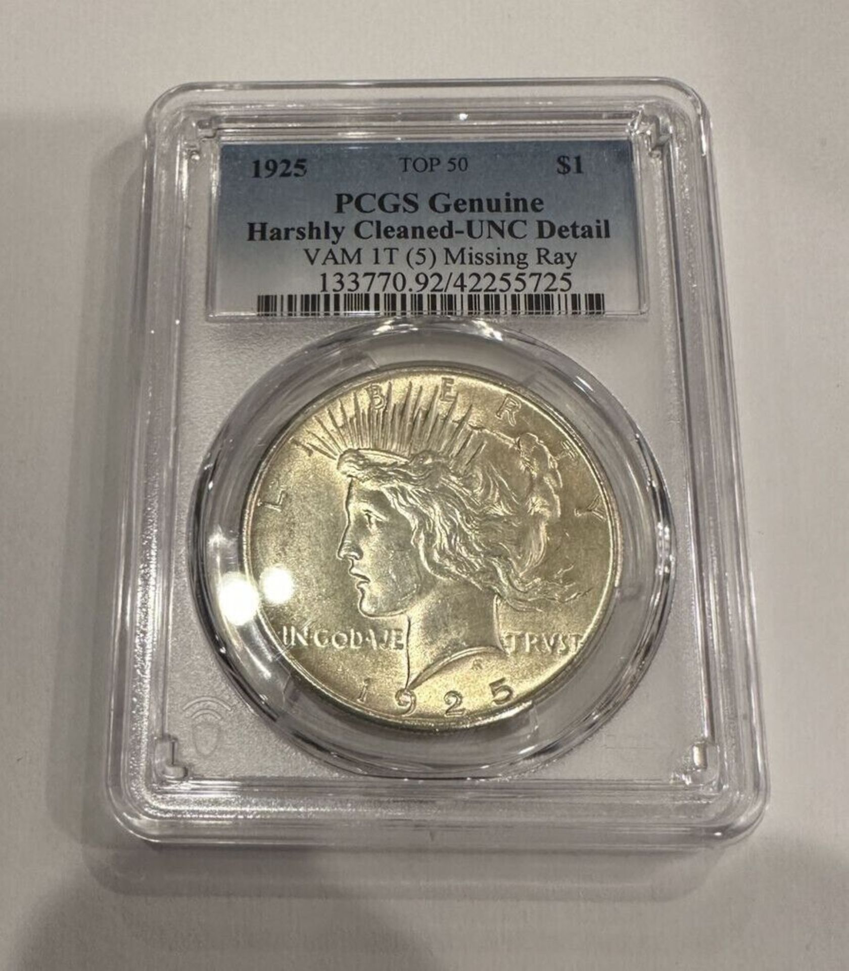 1925 $1 PCGS GENUINE HARSHLY CLEANED-UNC DETAIL COIN
