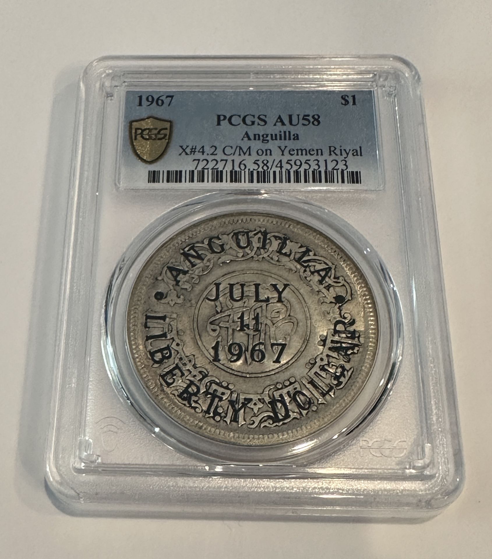 1967 PCGS AU58 ANGUILLA $1 PCGS YEMEN RIYAL SILVER