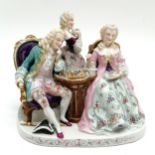 Antique German porcelain group of 3 figures playing chess - 19cm high ~ 4 chess pieces missing and