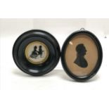 2 framed pen and ink silhouettes, circular framed of 2 children and an oval of a gentleman 15cm x