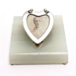 1893 silver heart shaped photograph frame desk clip on a white onyx base by John Septimus