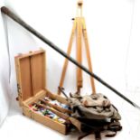 Vintage canvas rucksack with leather tags, folding artists easel, artists travelling oil paint