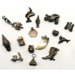 Qty of loose silver (some unmarked) loose charms inc motorbike, opening coffin charm with skeleton