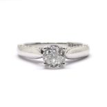 Forever 18ct white gold diamond solitaire ring with diamonds set either side of the ring on the head