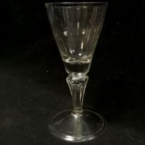 RARE c.1720 wine glass with unusual moulded panel stem terminating on a folded footrim - 15cm high &