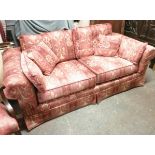 Pink upholstered 2 seater sofa 200 cms in width, 95 cms in depth, height to top of seat cushion 47