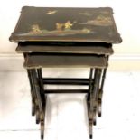 Nest of Oriental lacquer tables with gilded scenes to the tops 54cm x 36cm x 63cm high. Some