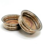 Pair of silver plated coasters with gadrooned borders and wooden inset bases - 14cm diameter & in