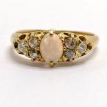 Antique unmarked (tests as 18ct) opal & diamond ring - size L½ & 3.1g total weight