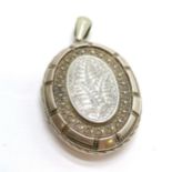 Unmarked antique silver locket pendant with engraved fern decoration - 6cm & 18.8g & in good used