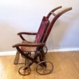 Antique child's folding perambulator with original fabric, in used condition. 95cm high x 38cm wide