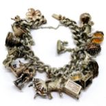 Silver charm bracelet with charms inc hippocampus, seashell, motorbike etc - total weight 95g