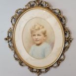 Hand tinted portrait photograph of a boy in a gilt wood florentine style frame with a Harrods