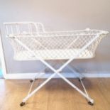 Victorian wrought iron baby's crib, 110 cms length, 48 cms wide, 90 cms high.