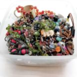 Qty of costume jewellery inc necklaces etc in a large clear tub