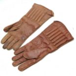 Pair of antique brown leather mens gloves with padded detail 35cm long.In good used condition.