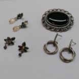 Black onyx silver hallmarked brooch by JL (5cm across), silver gargoyle type earrings set with pearl