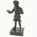 Antique bronze figure of a gentlemen reading on a black slate base - 15cm high ~ chips to base and 1