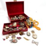 Vintage red jewellery box containing antique paste buckles, brooches, necklaces etc