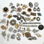 Qty of costume brooches & earrings inc Miracle fish, saxophone etc - some a/f