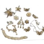 Qty of mostly unmarked silver filigree jewellery inc 7 brooches, bracelet, pendant + 2 broken