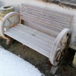 Wooden garden bench with cartwheel design to ends - 112cm x 56cm deep x 73cm high