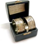 Boxed pair of silver napkin rings by Crisford & Norris Ltd in original fitted box - silver weight