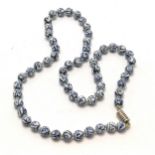 Strand of Chinese blue & white pottery beads - 64cm - SOLD ON BEHALF OF THE NEW BREAST CANCER UNIT
