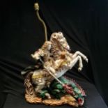 Impressive Italian figural lamp depicting George on horseback slaying a dragon (signed on base) -