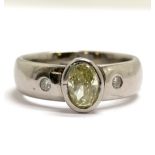 Palladium ring set with 2 white diamonds & central oval yellow diamond (approx 6mm long) - size