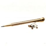14 ct rolled gold propelling pencil, t/w Italian silver 800 tortoise 3 cm in length.