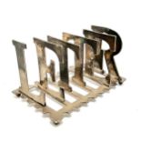 Silver plated letter rack in the form of characters forming the word "letter". 13cm Wide, 20cm long,