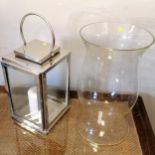 2 Contemporary lanterns, chrome lantern missing 1 glass side. tallest- H45cm x W26cm x D27cm.