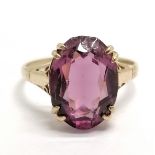 9ct marked gold purple stone set ring - size Q½ & 2.6g total weight ~ stone has chip at 1 end