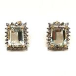 9ct hallmarked gold aquamarine & diamond (8 in total) set earrings - 4.2g total weight