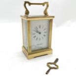 Mappin & Webb Ltd brass cased carriage clock - 15cm high (with handle) - runs BUT WE CANNOT