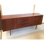 Mid 20th C teak sideboard . 183cm x 46cm x 80cm. In overall good used condition.