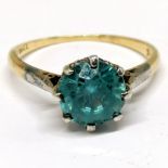 18ct marked gold blue topaz solitaire stone set ring - size N½ & 2.9g total weight ~ stone has wear
