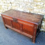 Antique oak coffer 142cm long, 56 cm deep x 72cm high. Split to the lid some old signs of worm to