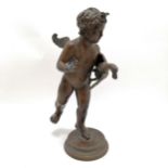 Classical bronze cast figure of cupid carrying a goose after the small fountain found in Pompeii (
