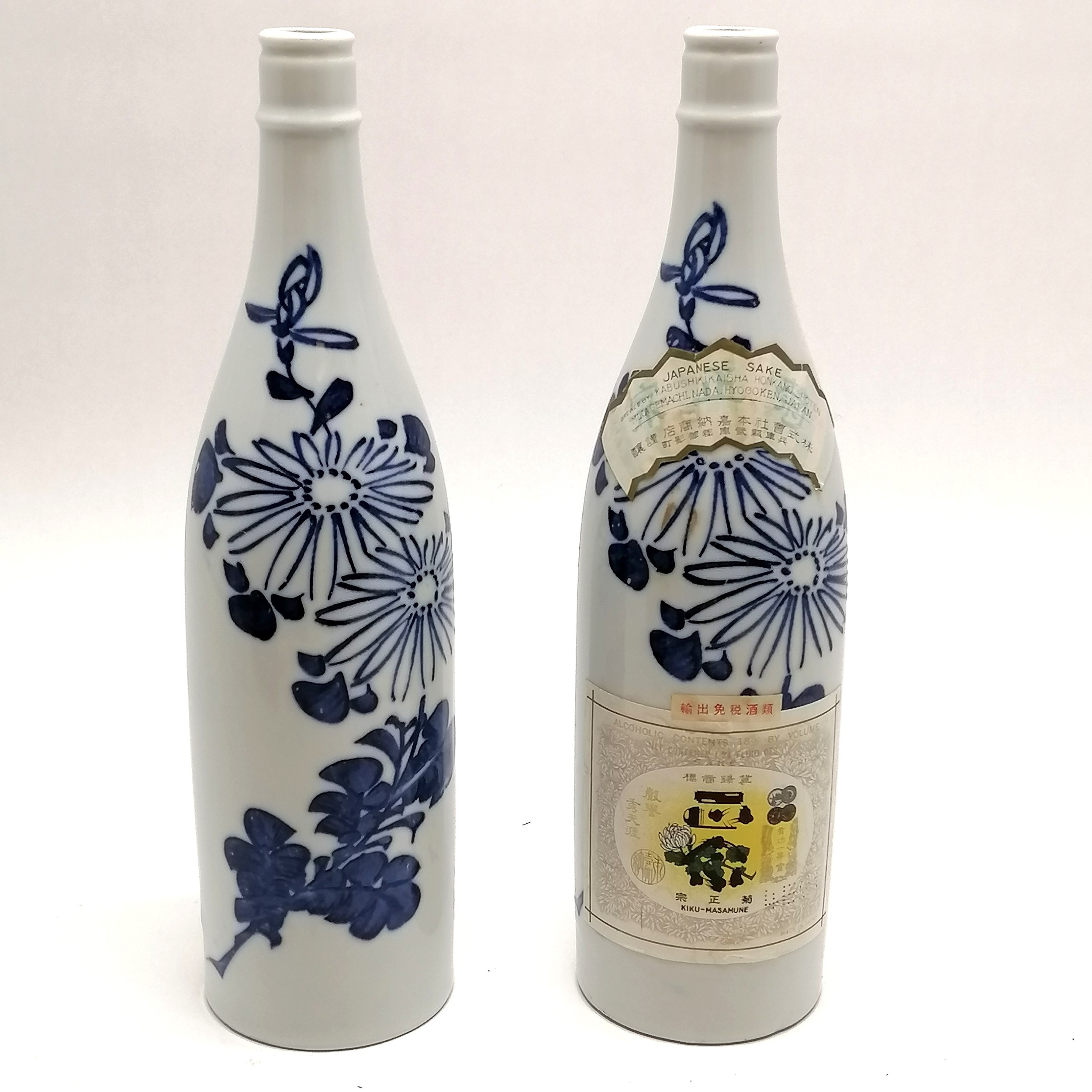 Pair of (empty) vintage Sake bottles - 1 with original label & 29cm high