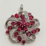 18ct marked white gold ruby & diamond set pendant - 3.5cm drop & 10.5g total weight