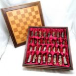 A continental metal chess set largest piece 8cms, complete with chess board box 40 cms in