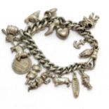 Silver charm bracelet (ex antique albert chain) with charms inc snail, witch etc ~ total weight