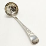 Georgian silver hallmarked sifting spoon with engraved decoration and gilding to the bowl 16cm &